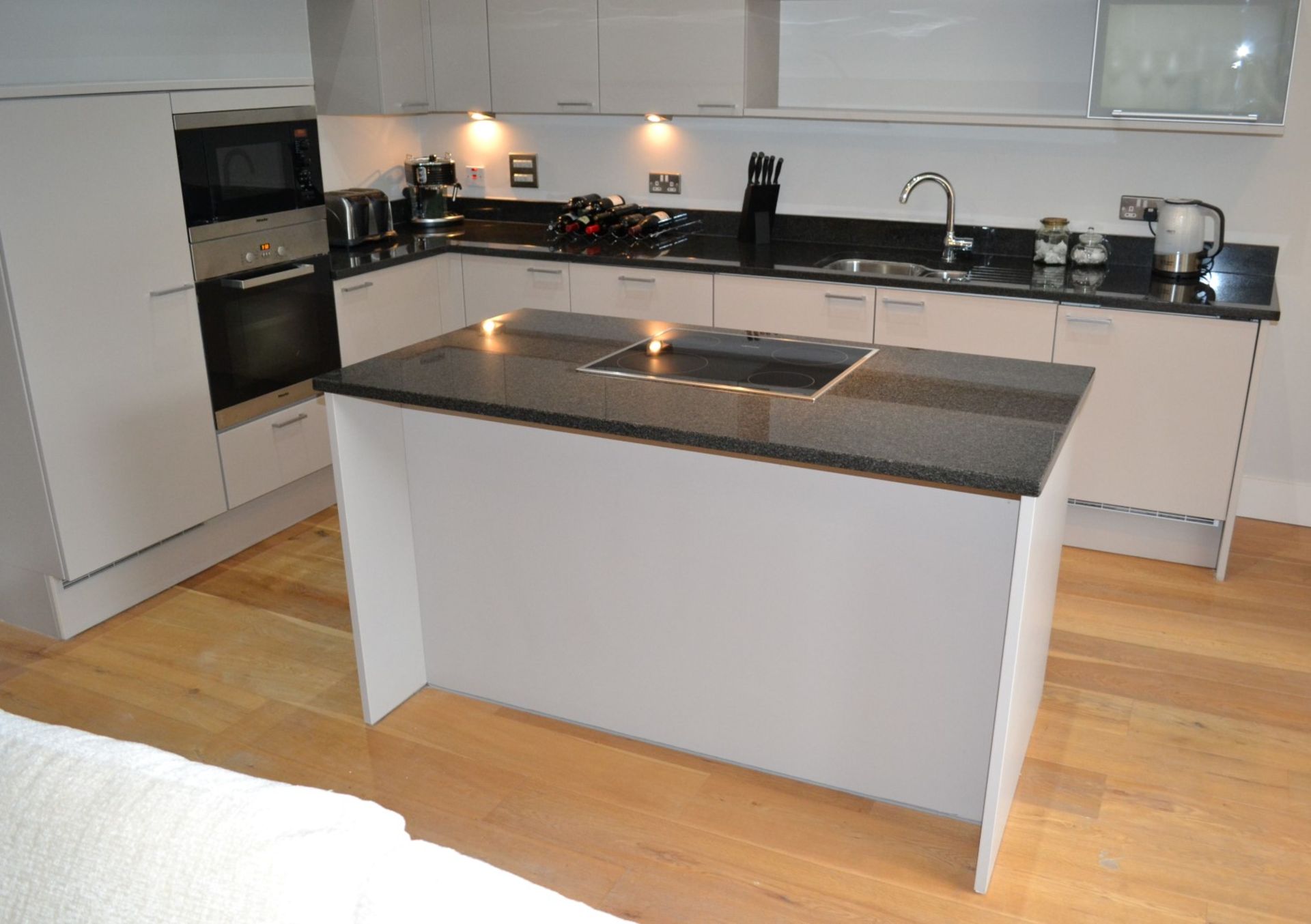 1 x Stunning Poggenpohl Kitchen With Black Granite Worktops and Miele and Siemens Appliances - In - Image 4 of 67