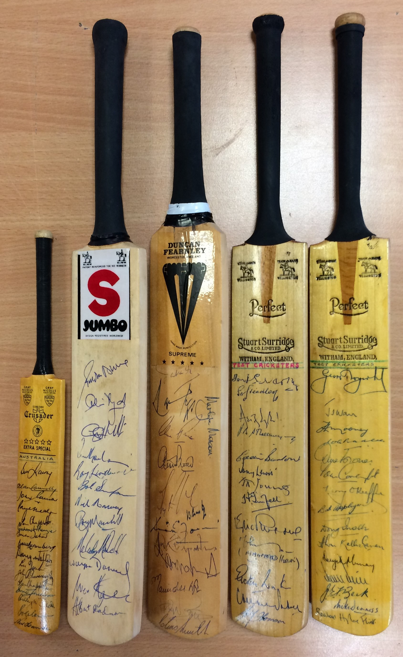 CRICKET: Small selection of multiple signed miniature cricket bats by various miscellaneous Test