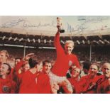 ENGLAND FOOTBALL: A good multiple signed colour 8 x 6 photograph by all eleven members of the