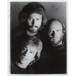 BEE GEES: Signed 8 x 10 photograph by all three members of the pop music group the Bee Gees,