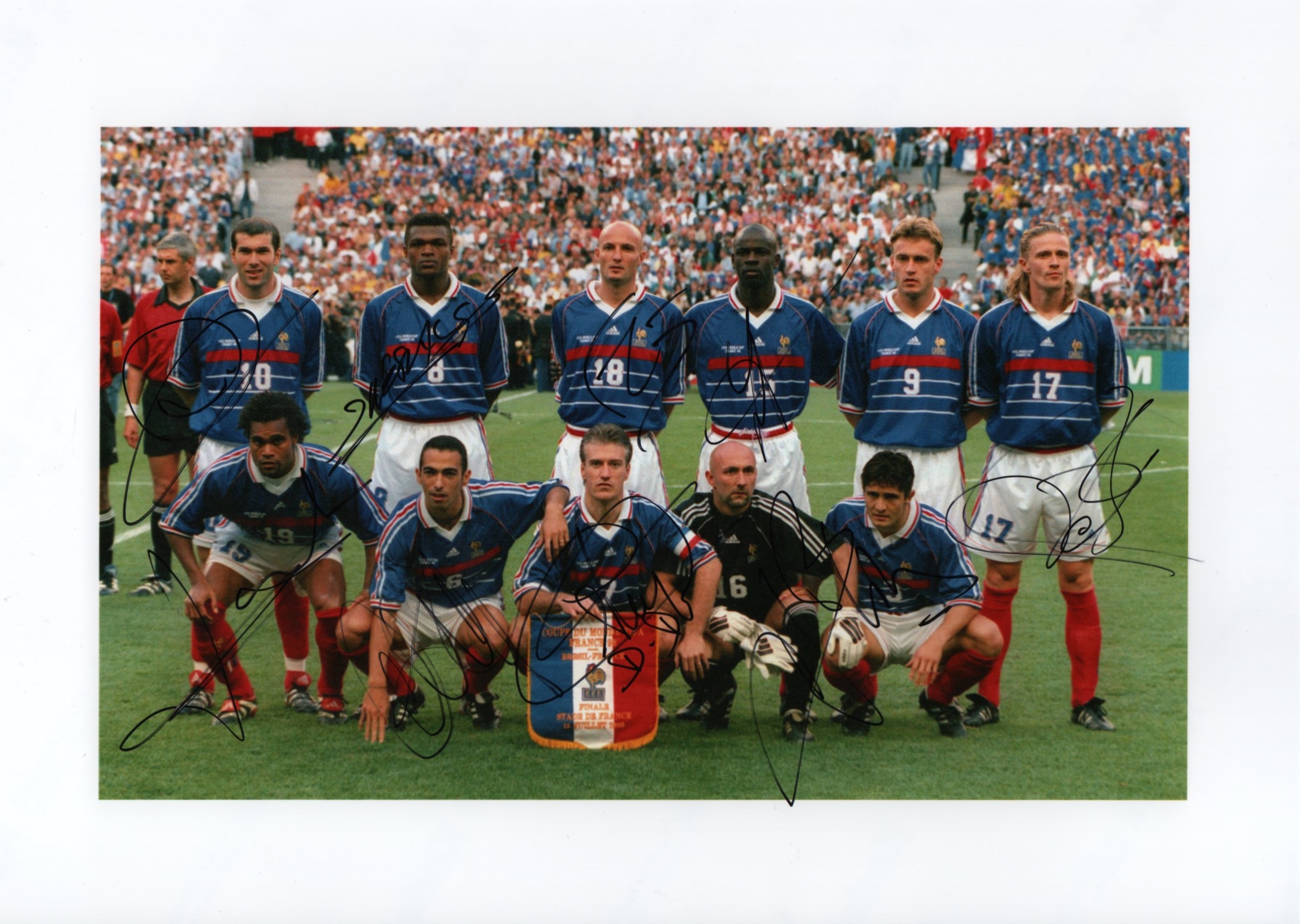 FRANCE FOOTBALL: A good multiple signed colour 12 x 8 photograph by ten members of the France World