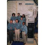 SPACE SHUTTLE: A rare multiple signed colour 8 x 11½ photograph by all seven crew members of