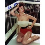 ACTRESSES: Small selection of signed 8 x 10 photographs by various actresses,