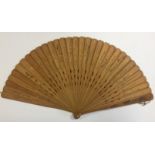 THEATRE: A wooden handheld fan featuring a painted decoration of several Japanese ladies in