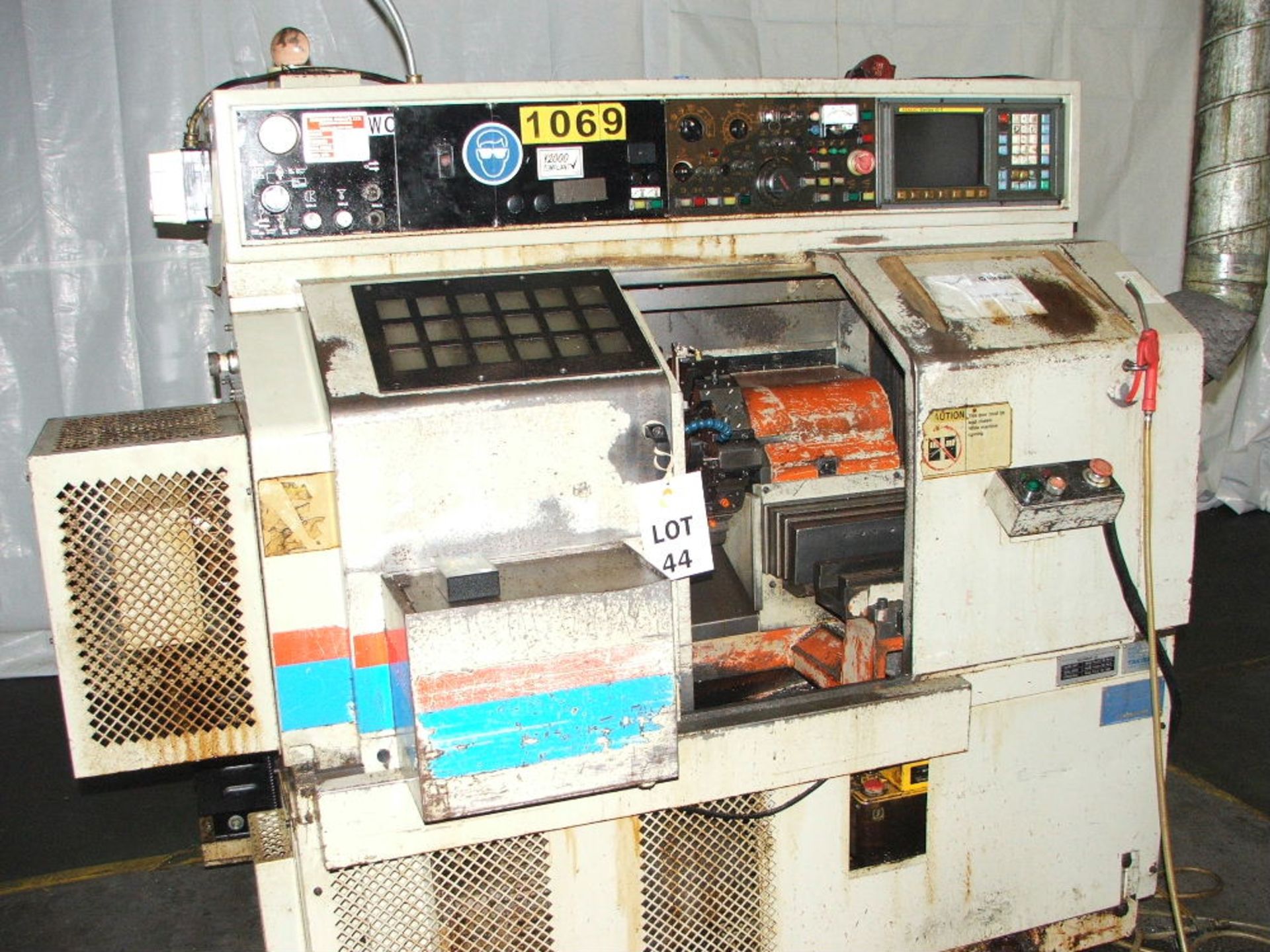 TAKISAWA TC1 12 STATION HORIZONTAL CNC LATHE WITH FANUC SERIES O-T CONTROL BUYER TO REMOVE