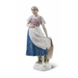 Porzellan - - Meissen. Jugendstilfigur 'Mädchen mit Apfelkorb'. Meissen, Ausführung Anfang 20.