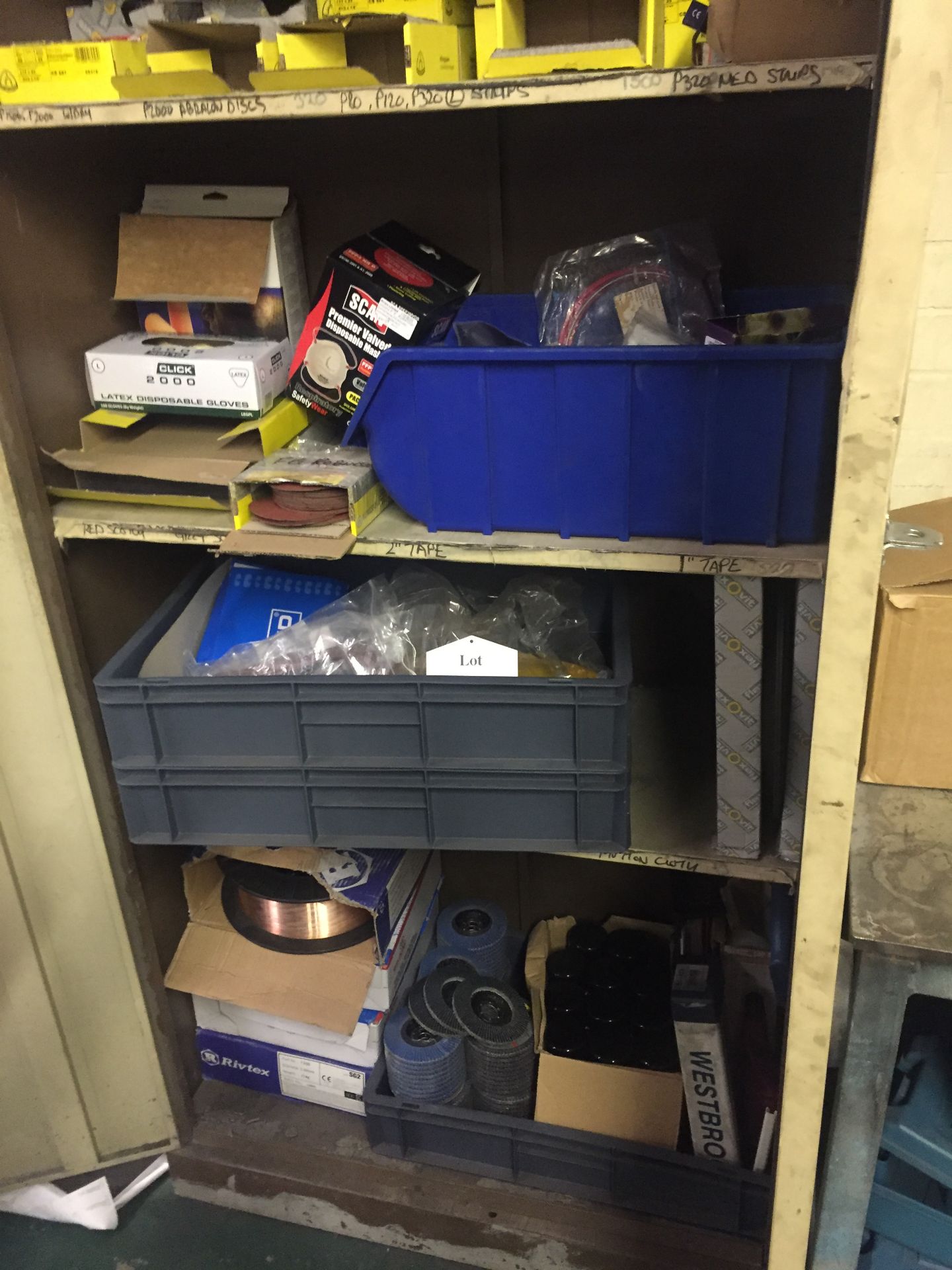 Contents of cupboard as peer photos