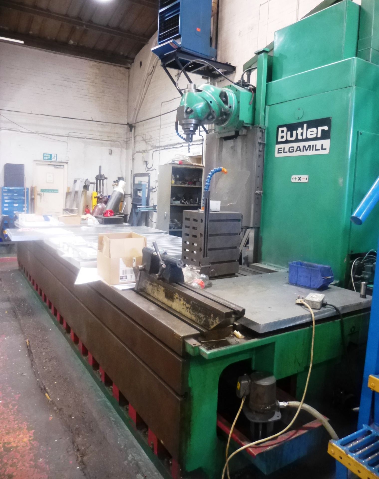 Butler Elgamill travelling column universal milling machine with universal head and 5 x 1.2 m T slot
