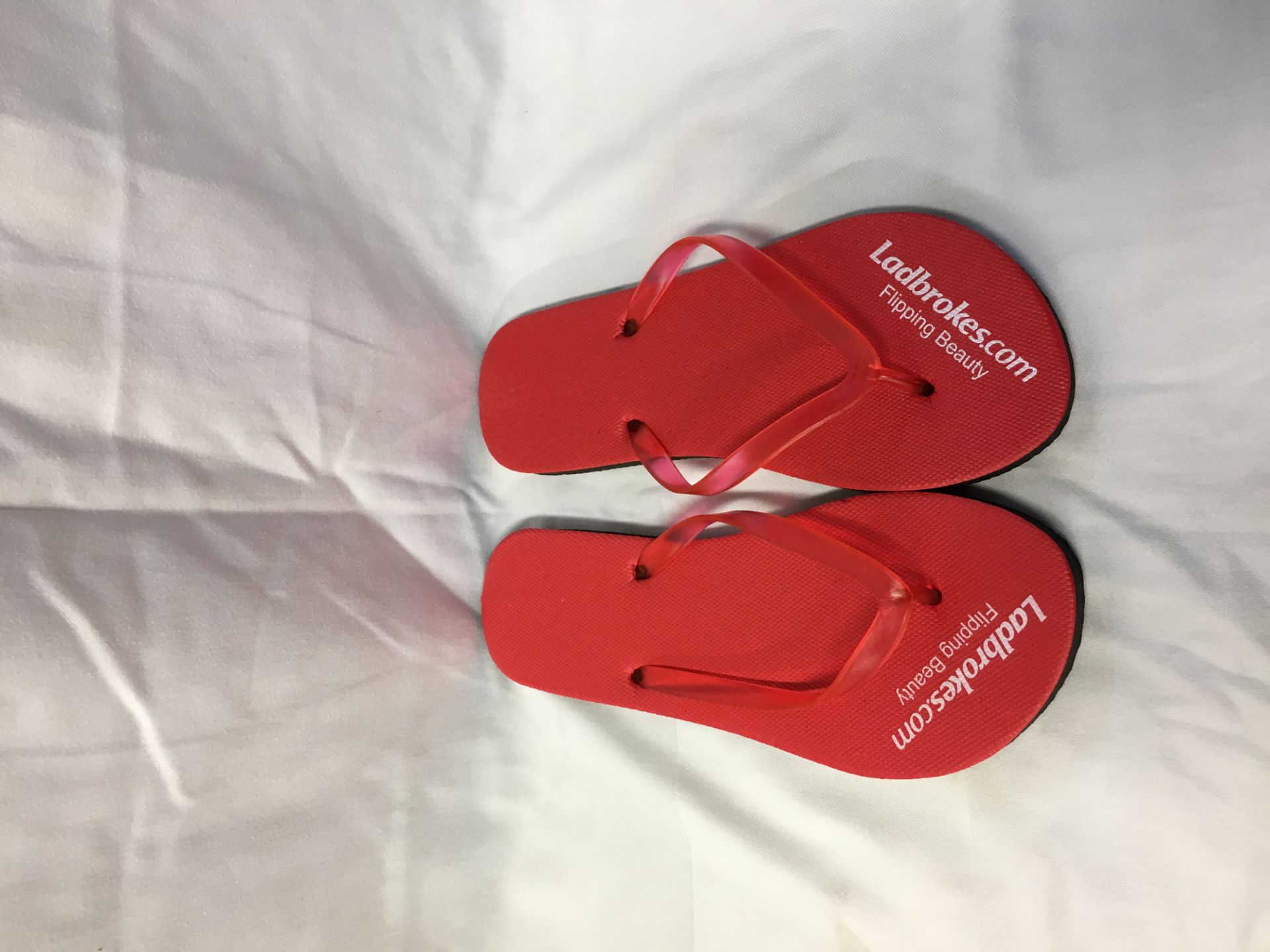 26 x Boxes of Ladbrokes.com themed Flip-Flops - 1300 Pairs