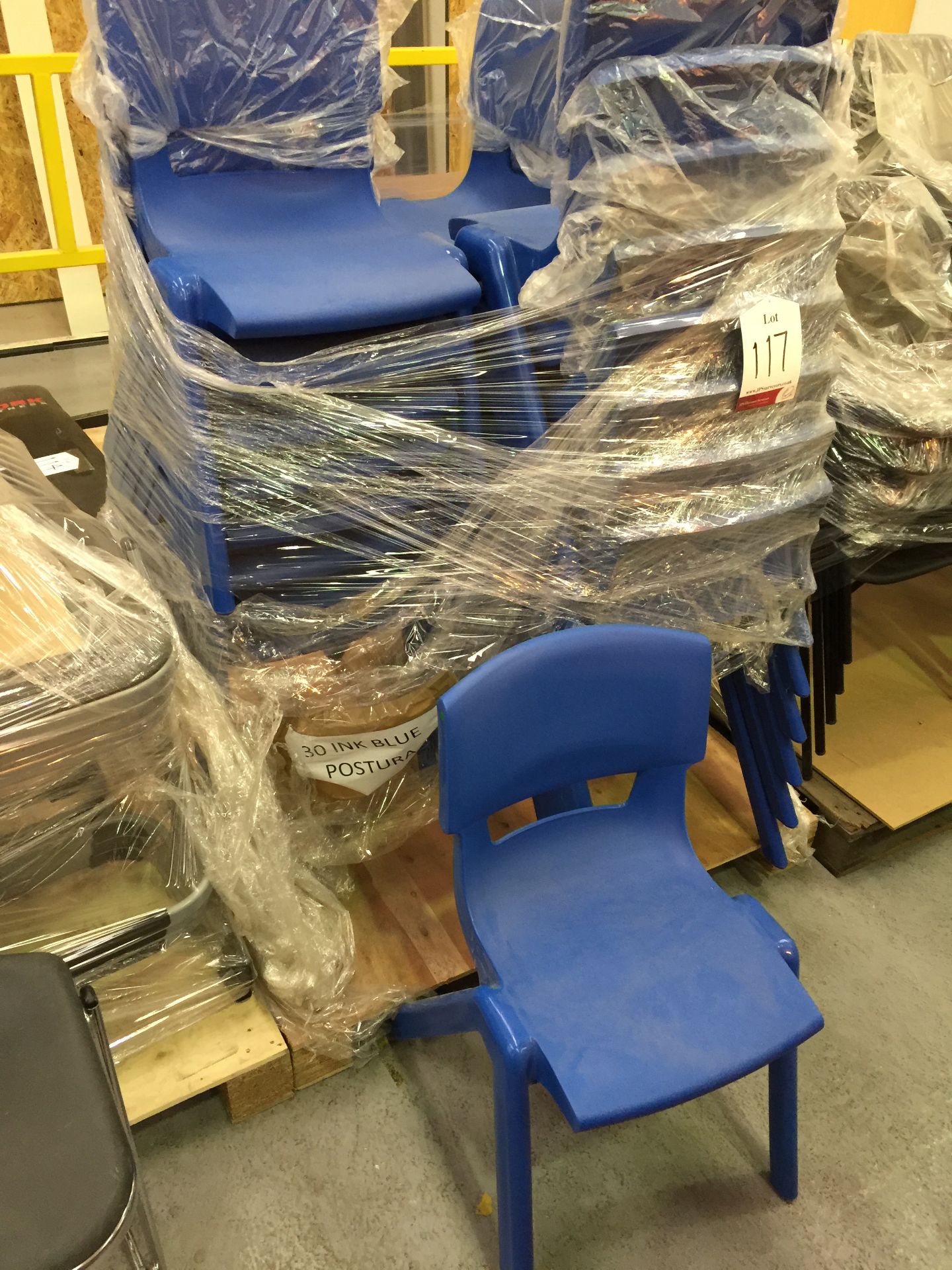 24 blue plastic chairs