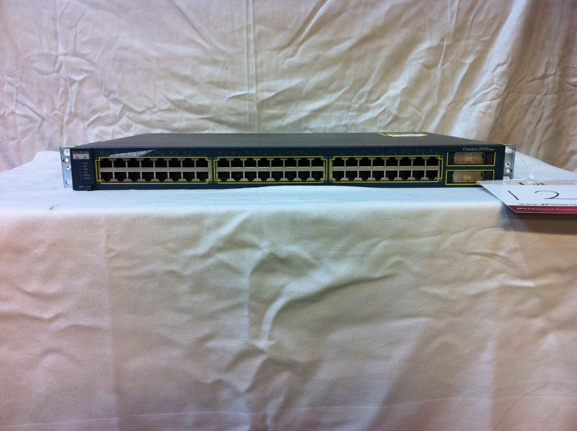 Cisco 1900 Series router and Cisco Sytems Ethernet Switch.