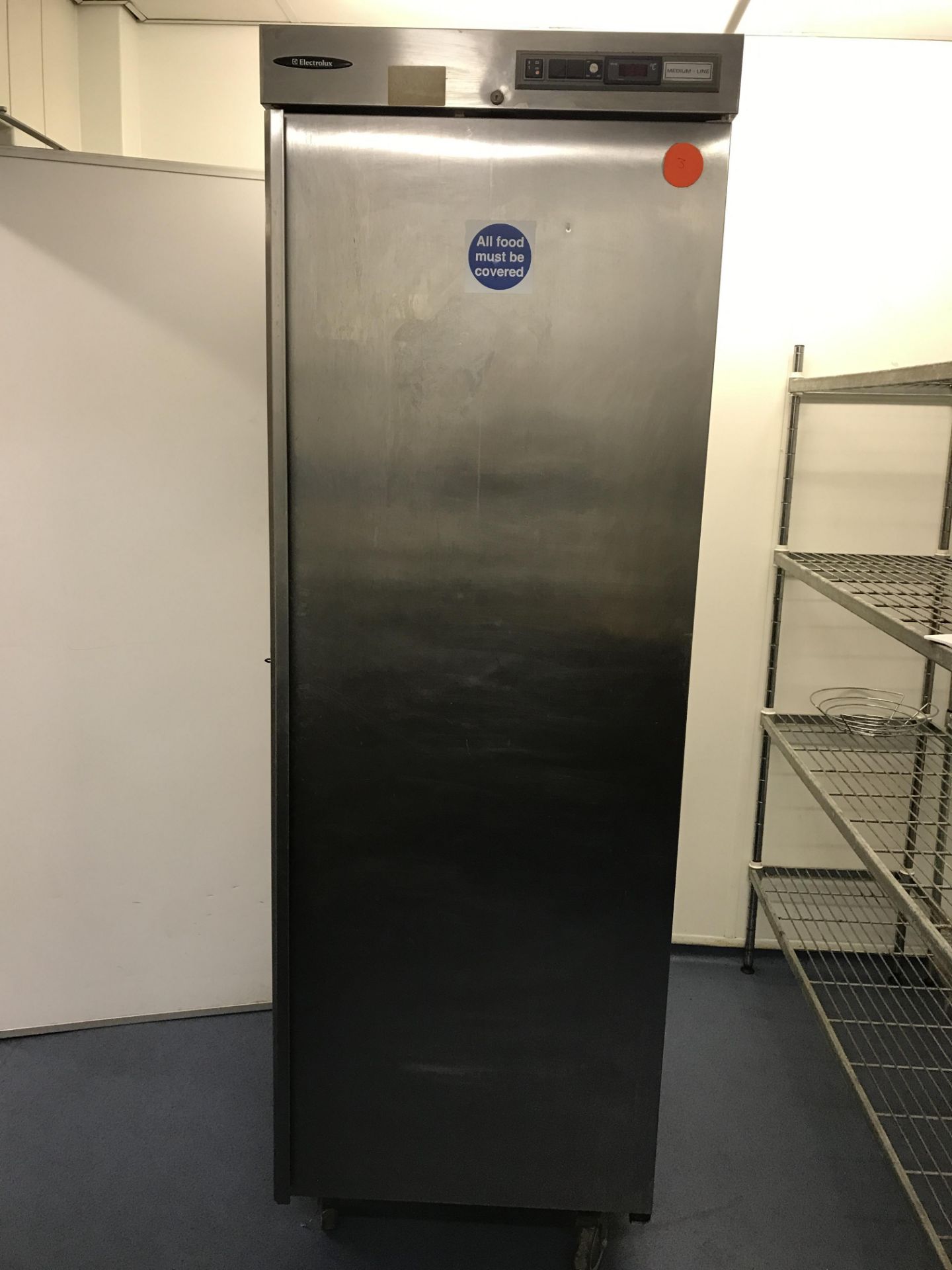 Electrolux RS26 stainless steel upright fridge on castors