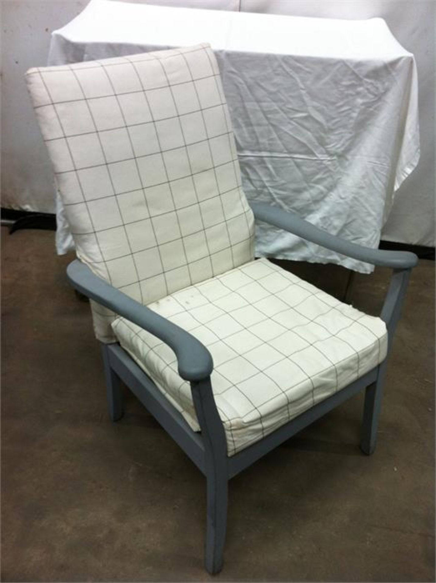 Grey frame chair with spring base