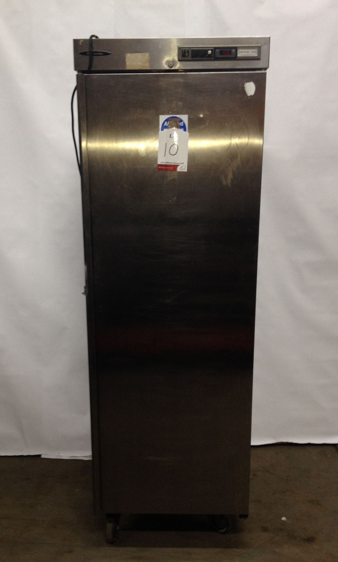 Electrolux RS26 stainless steel upright fridge on castors