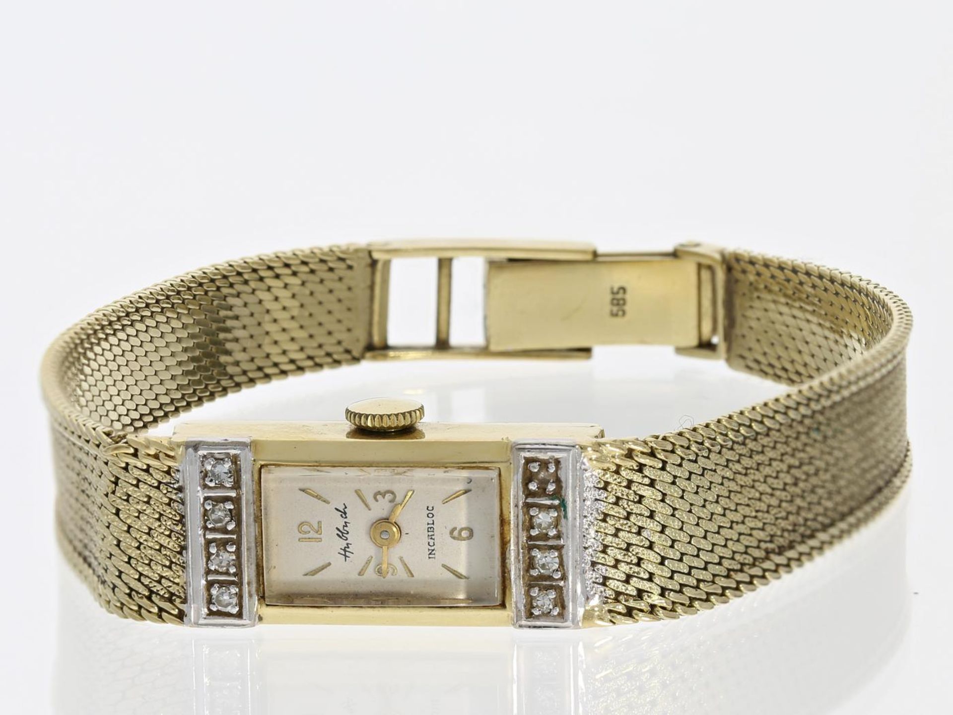 Armbanduhr: vintage Damenuhr, 14K Gelbgold mit Diamanten, Marke Hubbuch Ca. 18,5cm lang, ca. 23g,