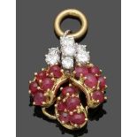 Anhänger mit Brillanten und Rubinen A diamond and ruby pendant. 750er GG und WG, gestemp. Punze: GJ.