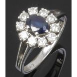 Klassischer Damensaphirring A Lady's sapphire and diamond-halo ring 750er WG, gestemp. 1 Saphir im