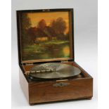 Polyphon "Kalliope" mit 10 Glocken Polyphon with 10 bells and 14 disc records Um 1900. Holz. 18,5