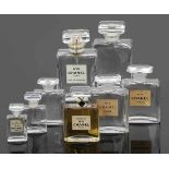 7 Flakons Chanel Farbloses Glas, formgepresst. Bez. z. T.: Chanel France - Eau de Parfum 50 ml (