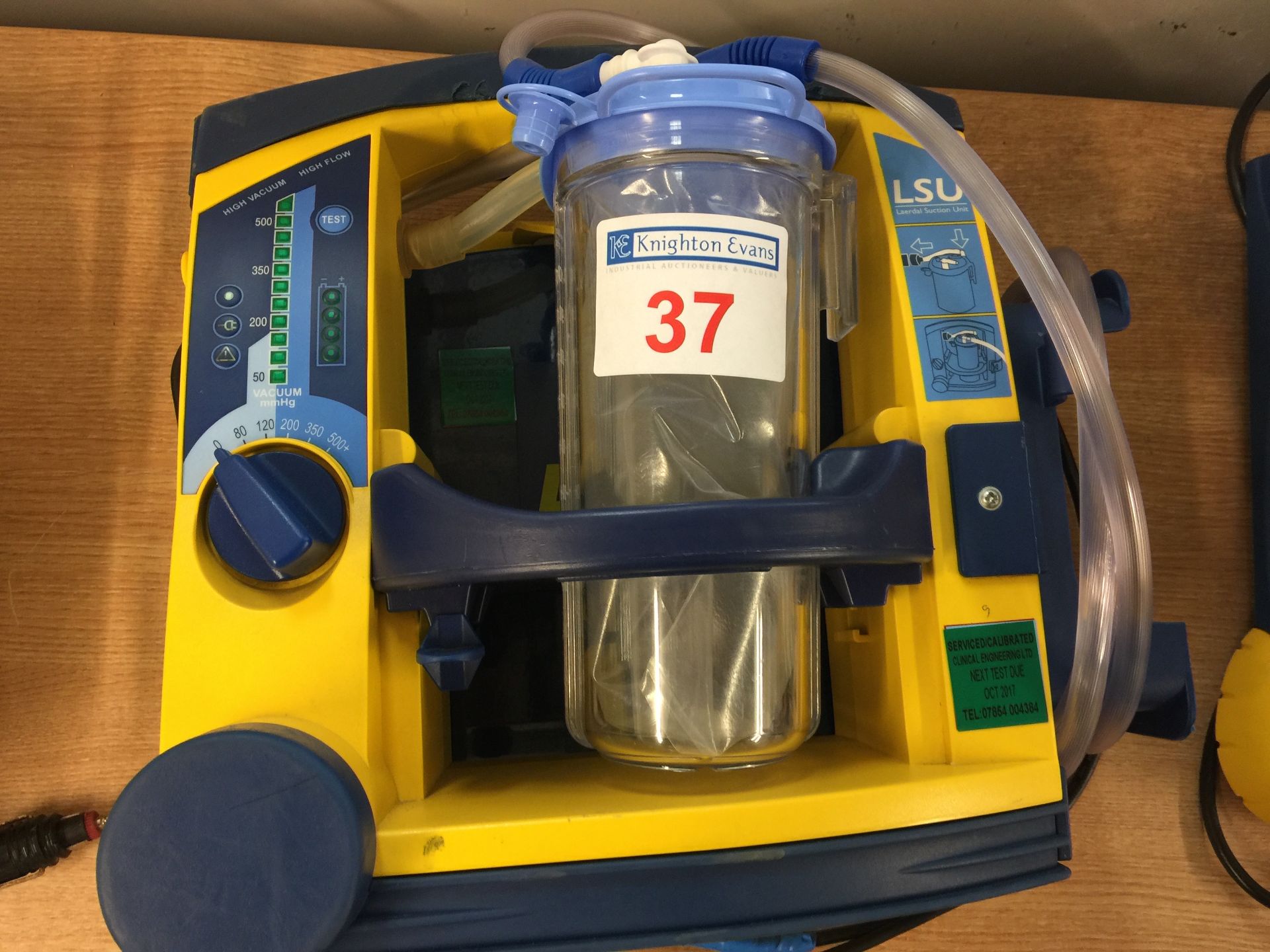 Laerdal LSU portable suction unit with mounting plate and 12v charger, test due October 2017