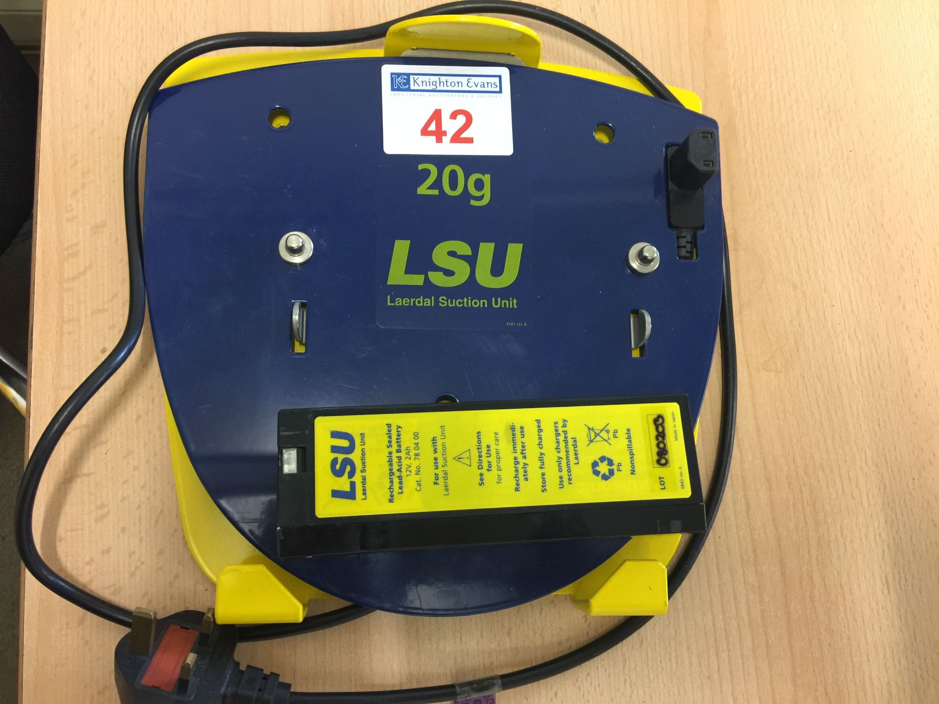 Spare Laerdal LSU portable suction unit mounting plate and battery