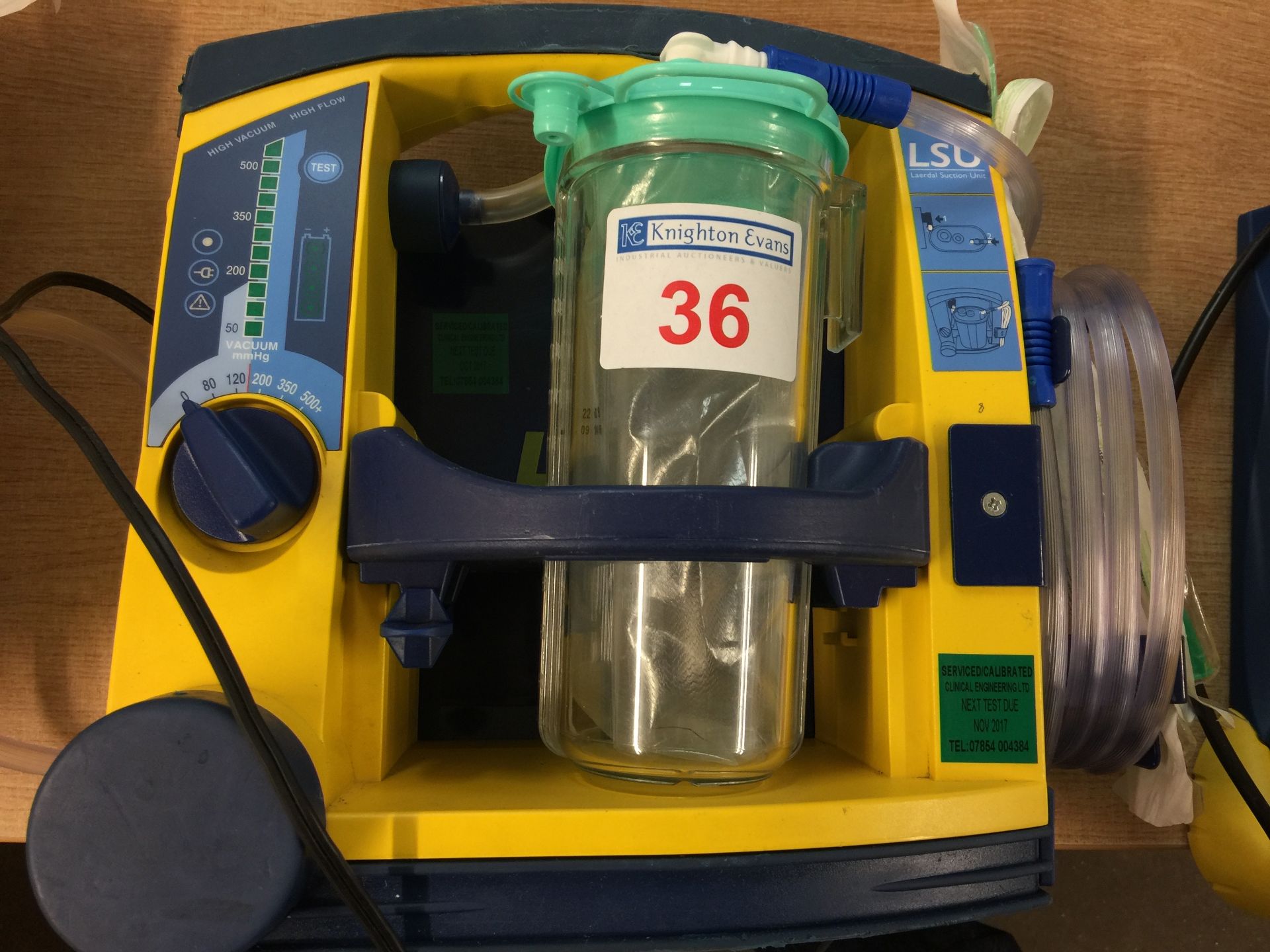 Laerdal LSU portable suction unit with mounting plate and 12v charger, test due November 2017