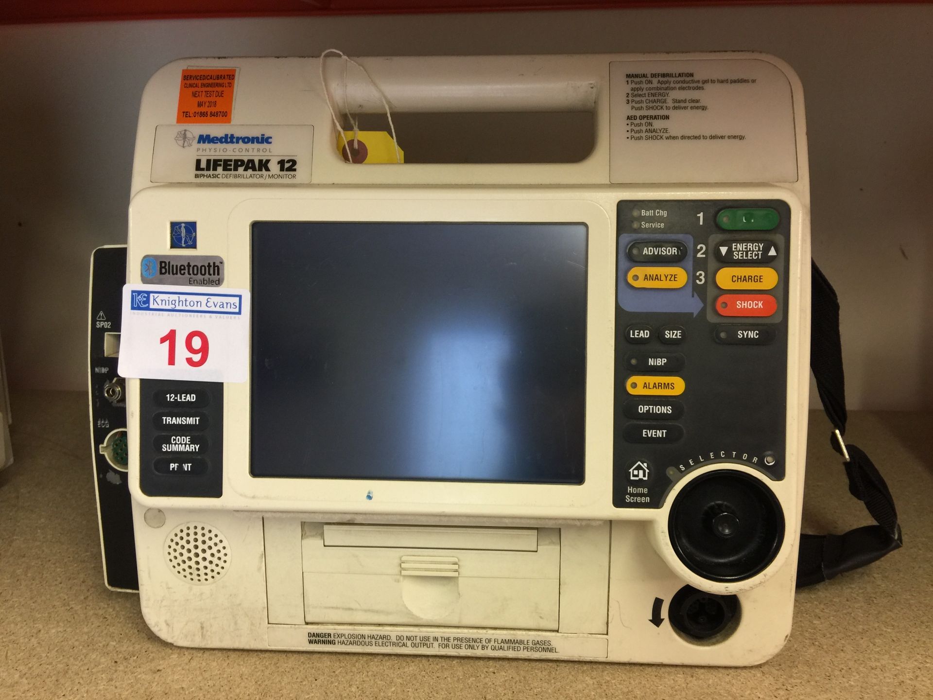 Medtronic Physio Control Life-Pak 12 portable defibrillator base unit with batteries, test due May