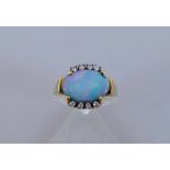 Damenring, 585 Gelbgold mit Mondstein - Cabochon u. acht Diamanten, RG 19mm, 4,3g.