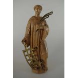 Heiligenfigur, 19.Jh., Hl. Laurentius, Holz vollrund geschnitzt, mit Attributen aus Metall, h. 23cm