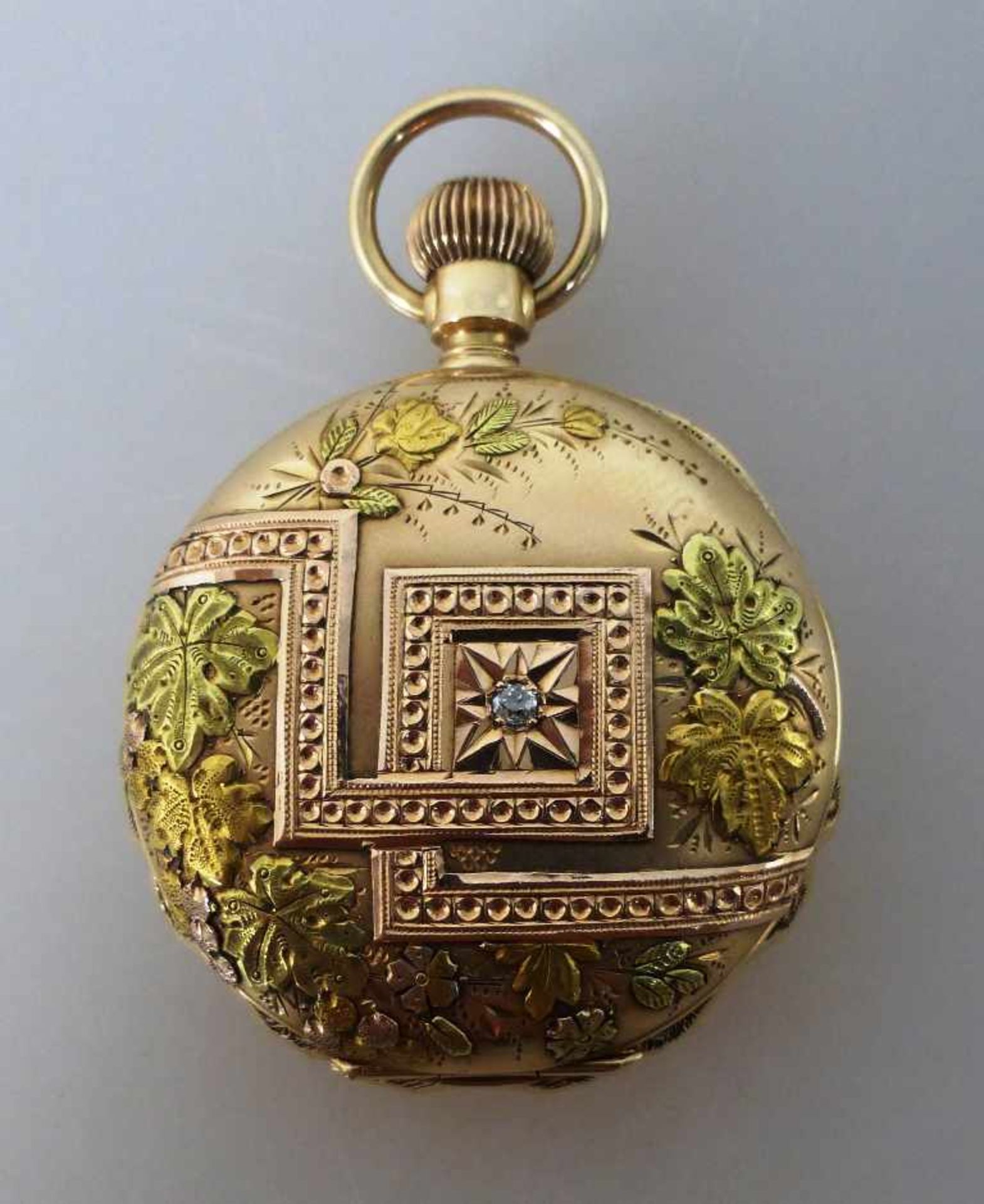 Goldtaschenuhr, Elgin Natl. Watch. Co., Goldgehäuse mit reliefierten Mehrfarbengold - Ornamenten,