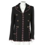 A Chanel Boutique black tweed jacket, 2000s, labelled and size 40,