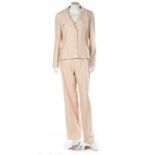A Chanel Boutique cream silk trouser suit, 1990s, labelled and size 42,