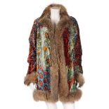 An Oscar de la Renta velvet and racoon-fur trimmed jacket, 1990s, labelled,