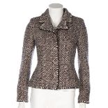 A Chanel flecked brown tweed jacket, 2001, labelled and size 36, with clear CC buttons,