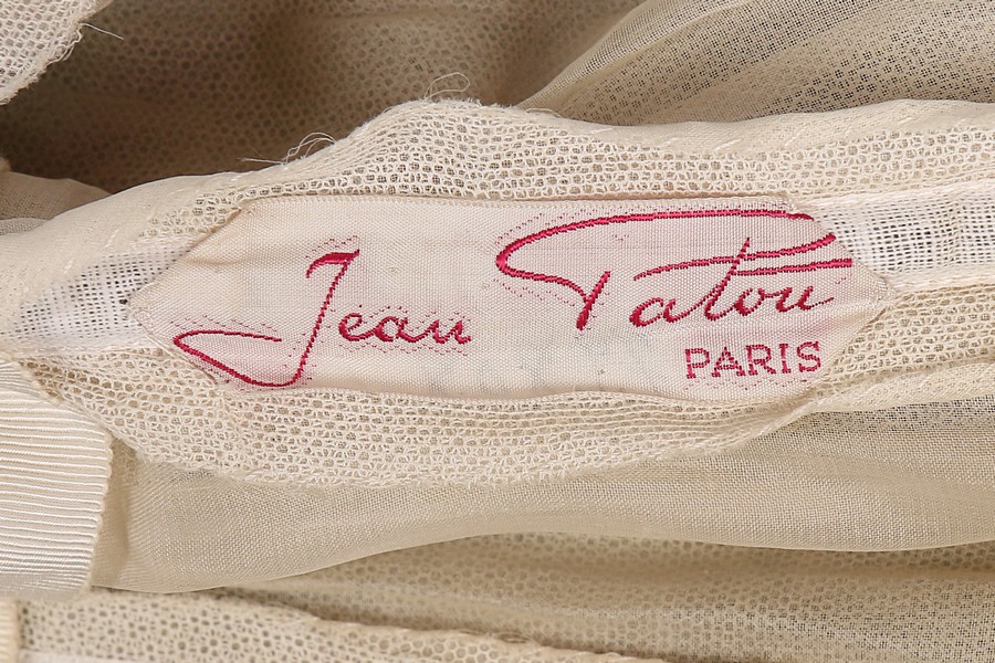 A Jean Patou chinoiserie brocaded satin gown, circa 1960, pink on white woven label, numbered 79808, - Image 7 of 8