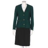 A Chanel forest green boucle wool jacket, 1990s, boutique labelled and size 36, with CC buttons,