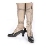 A pair of ladies grey leather and black patent knee-high boots, 1910-15, stamped 21/2 to the sole,