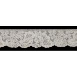 Mechlin bobbin lace, 18th century, including a finely worked length with motifs including daffodils,