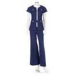 A Courreges navy wool trouser suit, circa 1970, Couture Future label, with large white plastic zip,