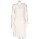 A Chanel white cotton-tweed suit, 2005, labelled and size 38,