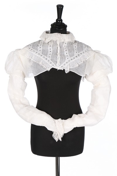 A whiteworked muslin spencer bodice, 1810-20, empire-line with frilled cutwork collar,