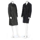 A group of designer clothing, mainly Prada, modern, comprising a Prada black wool coat,