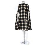 A Pauline Trigere checked wool cape, late 60s or early 70s, large woven label,