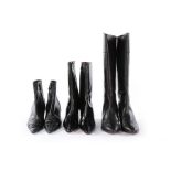 Designer black leather boots, modern, comprising two pairs of Christian Louboutin,