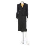 A Chanel Créations 'Le Smoking' inspired tweed suit, 1970s, labelled and size 6,