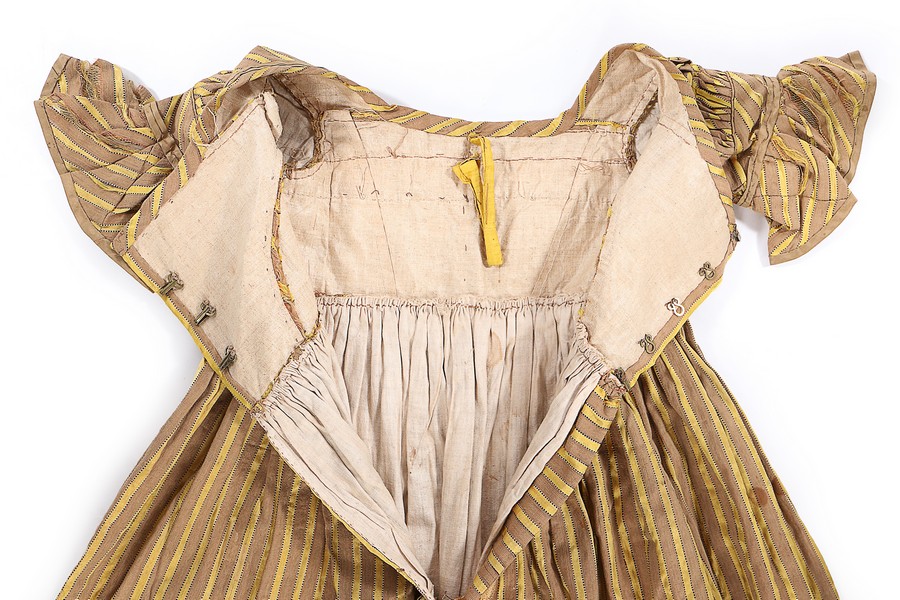 A striped satin girl's dress, late 1830s, with high V-shaped waistline, - Image 7 of 8