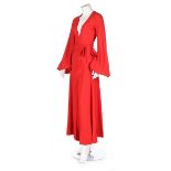 An Ossie Clark red crêpe 'Cuddly' wrap-over dress, circa 1970, printed satin label,