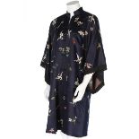 A woman's embroidered navy satin informal robe, changfu, Chinese, circa 1900,