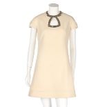 A Pierre Cardin ivory wool mini-dress, late 1960s, Promotion labelled,