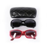 Two pairs of Chanel sunglasses, 2000s, the first with white camellias and double 'C' to frames,